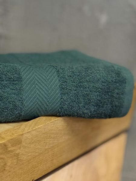 Рушник Ecotton 50х80 см махровий зеленого кольору Dark Green 25233 фото
