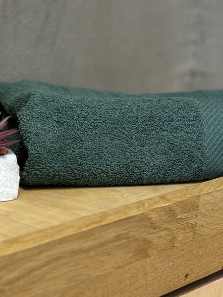 Рушник Ecotton 50х80 см махровий зеленого кольору Dark Green 25233 фото