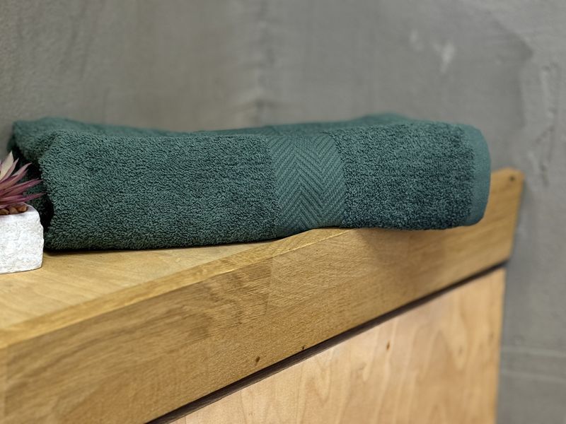 Рушник Ecotton 50х80 см махровий зеленого кольору Dark Green 25233 фото